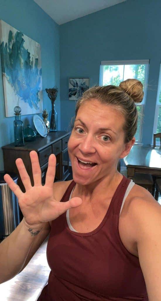 photo of Women holding up a high five