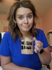 Photo of a women enjoying a cup of Mojo coffee replacement