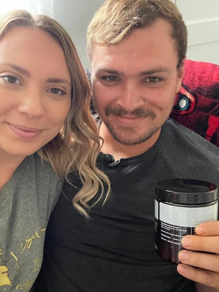 Husband & wife holding up their favorite Tranont product Zest