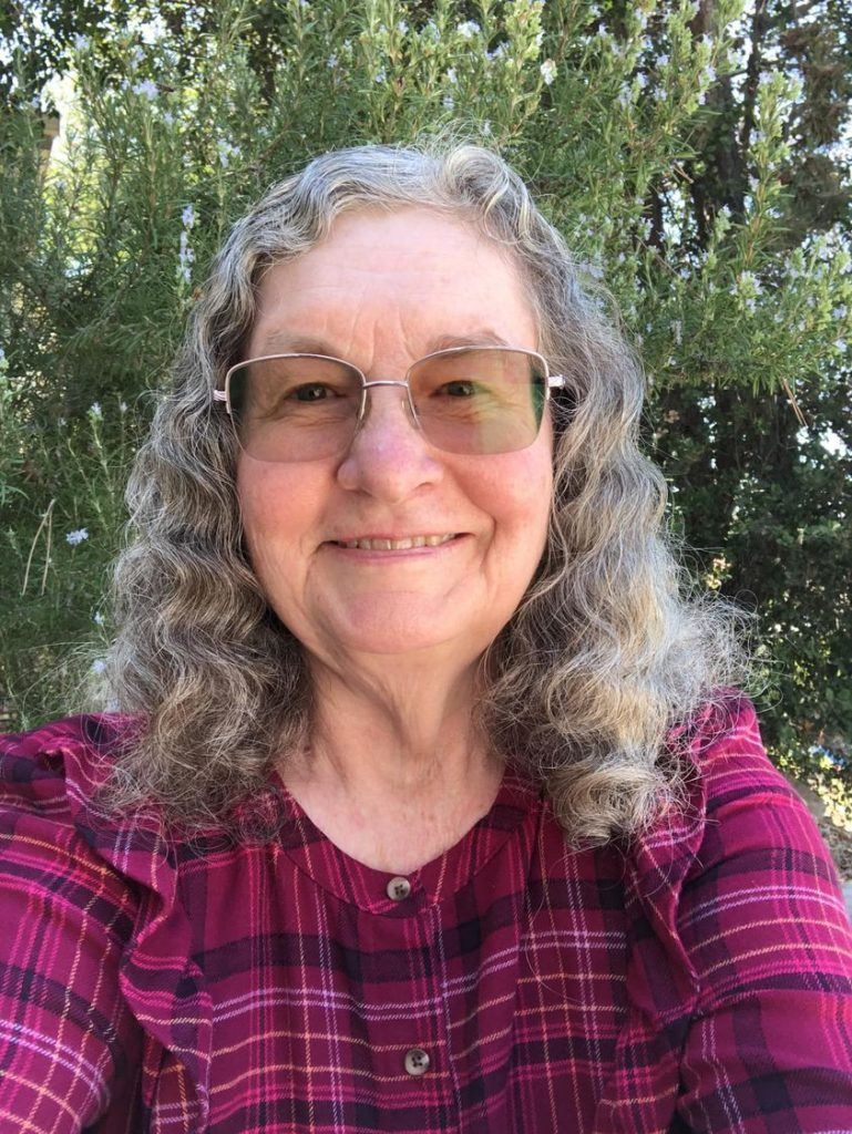 Woman showing results from using Glow liquid collagen