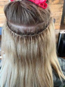 photo of hair extensions with growth due to Glow collagen