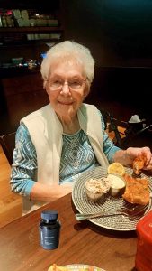 Sweet lady enjoying the benefits of eating what she wants