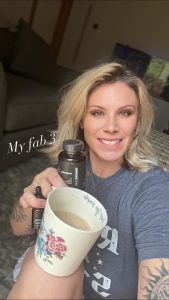 lady holding up her 3 favorite products