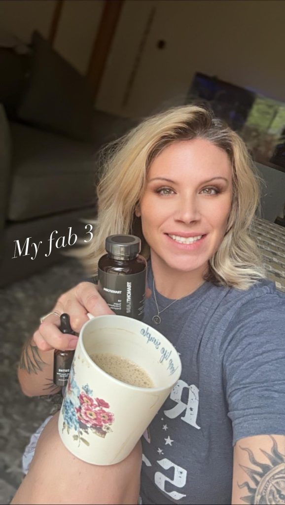 lady holding up her 3 favorite products