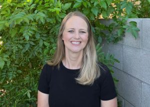 a picture of a woman smiling really big