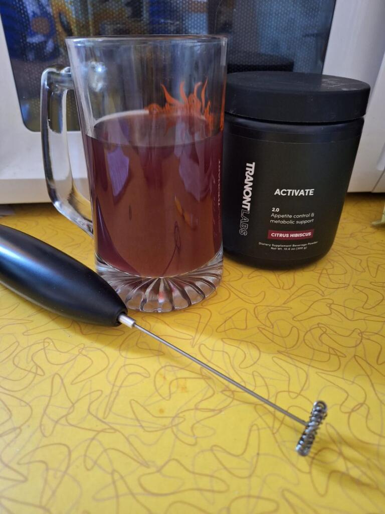 A bottle of Activate and a mixed up drink